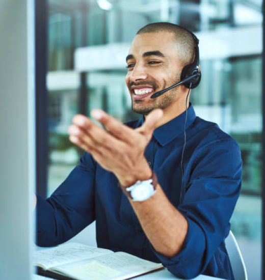 Shot of a young call centre agent working in an office